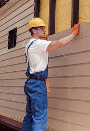 Best Vinyl Siding Installation  in Roundup, MT